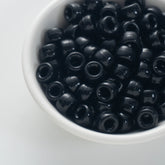 BD00048-02-pure-black-barrel-opaque-pony-beads-6×9mm